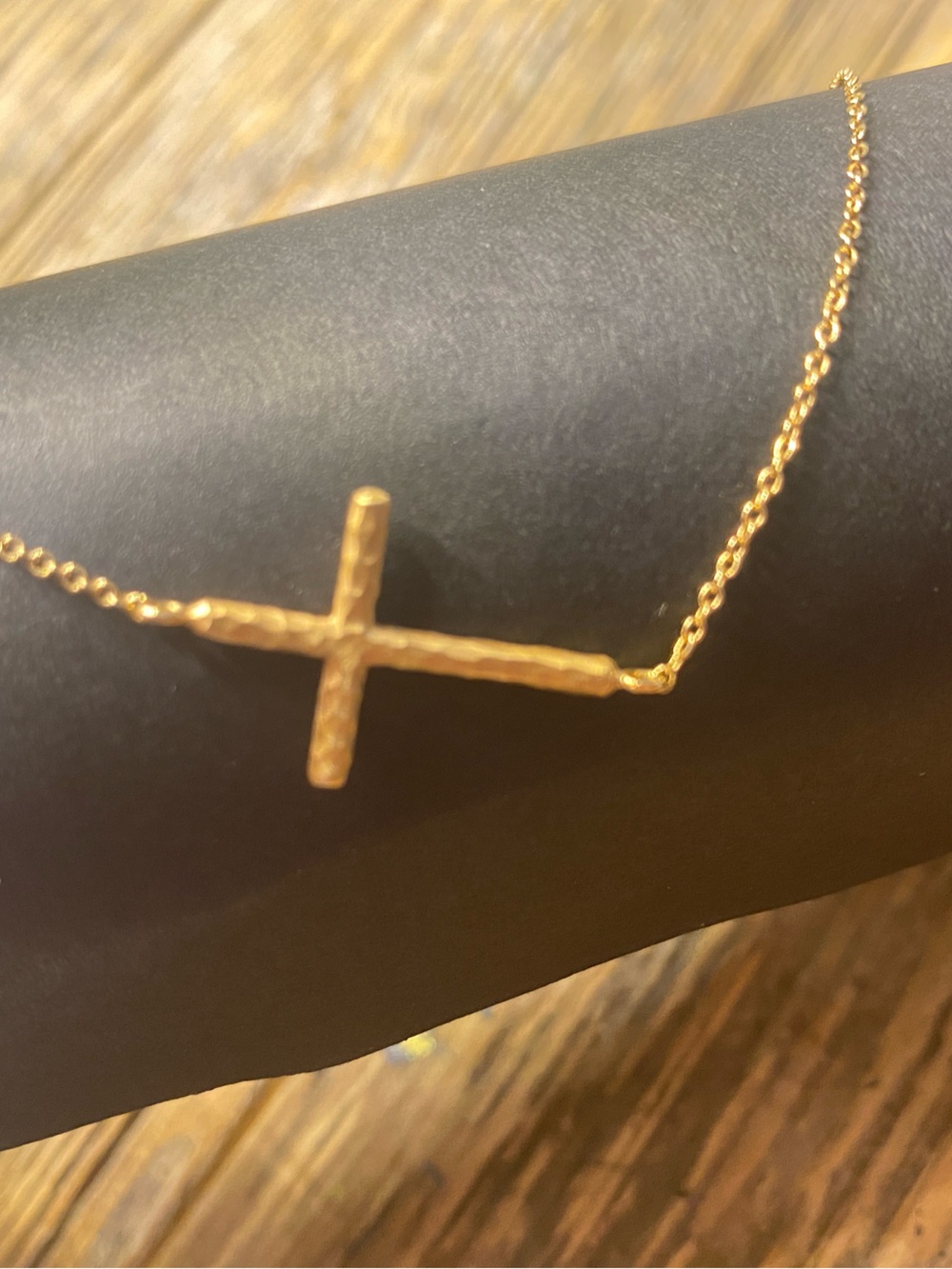 Tiffany and Co. Paloma Picasso 18 carat gold hammered sideways cross necklace